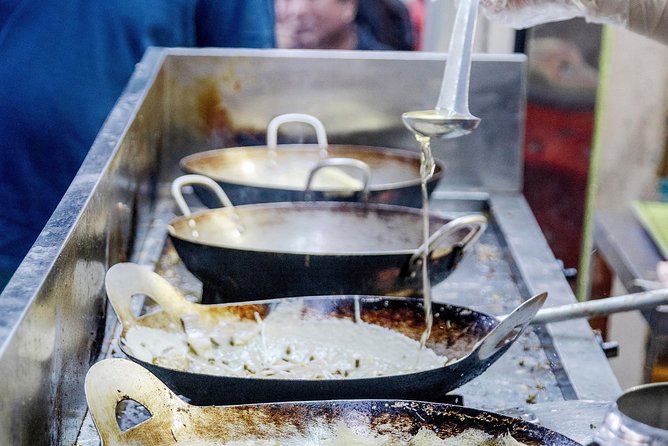 Private Street Food Tour by Scooter in Ho Chi Minh City - Nguyen Thien Thuat apartment buildings and old Saigon