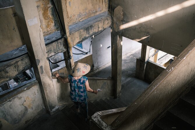 Private Sunset Photography Tour - Travel through history and time - Starting at an old building beneath Bitexco Tower