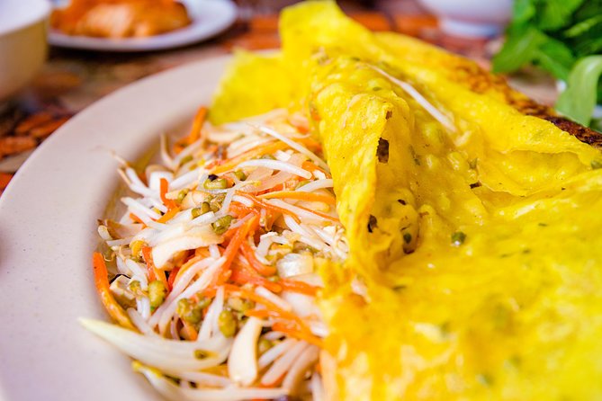 Private Vegan Food Tour By Scooter in Ho Chi Minh City - District 3 begins with food and Buddhist history