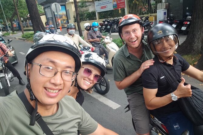 Ride Saigon: Private Half-Day Motorbike Adventure - Ba Thien Hau Temple adds incense and detail