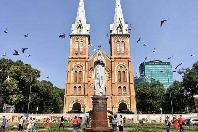 Sai Gon City Tour and Dinner On Cruise Half Day - Boarding the Saigon River dinner cruise
