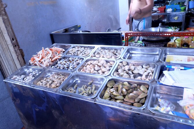 Saigon at Night Walking Street Food Tour - Walking through Nguyen Thien Thuat’s old apartments