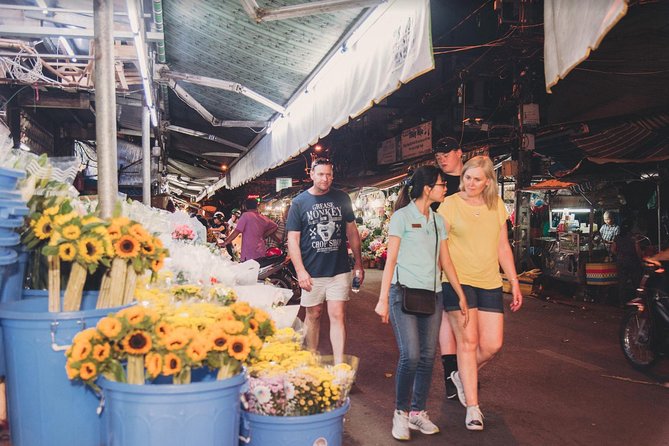 Saigon Authentic Walking Street Food Tour 12+ Tastings Included - The night flower market adds color and local rhythm
