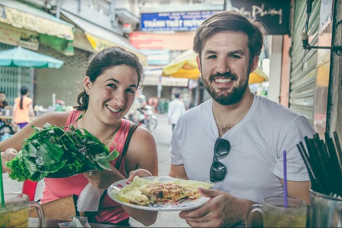 Saigon Authentic Walking Street Food Tour 12+ Tastings Included - The guides are the heart of the evening