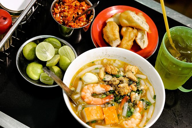 Saigon Backstreets City Tour on Scooter including Food - Districts 10 and 5 show another side of the city