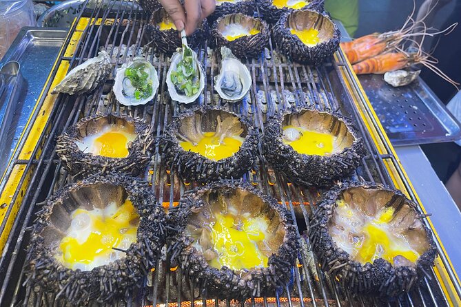 Saigon By Night and Street Food By Motorbike | Opt: Ao Dai Riders - Safety, comfort, and the Ao Dai rider option