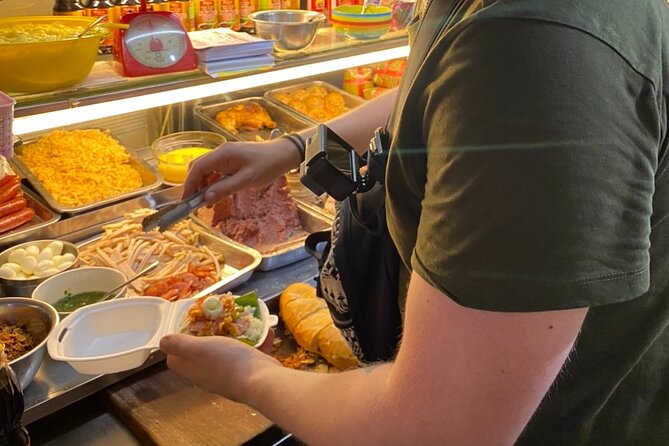 Saigon by Night: Private Street Food Walk You Can’t Miss - Making your own banh mi