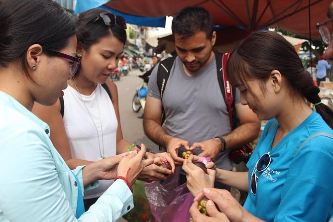 Saigon City Highlights: Half-Day Private Tour by Car - Ben Thanh Market and everyday city life