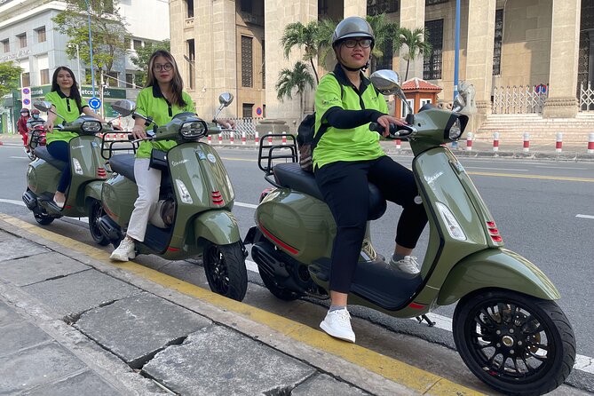 Saigon: City Unseen Highlights 2h Tour | Opt: Ao Dai Riders - Nguyen Hue Street: modern Saigon beside French-era buildings