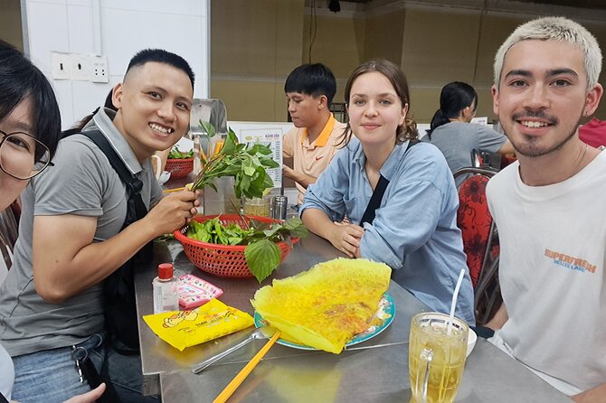Saigon Food Tour by Scooter with Eleven Tastings - Ho Thi Ky Flower Market brings food and city life together