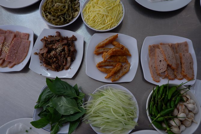 Saigon luxury food tour on motorbike with 10 authentic dishes - A guide who handles the city for you