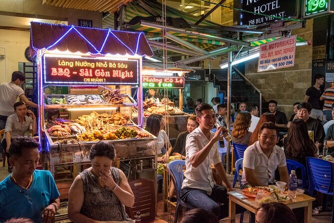 Saigon Night Bites on Foot: Local Vendors, Stories & Sweet Finish - Dumplings, spring rolls, and grilled beef