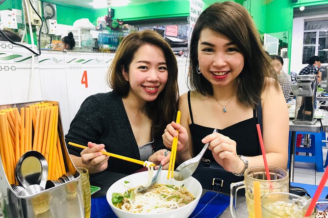 Saigon Night Scooter Experience And Local Food - District 4, the river, and evening food lanes