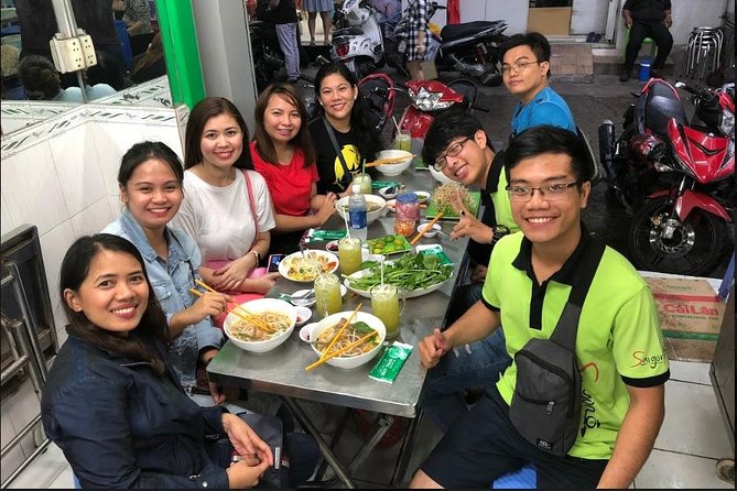 Saigon Night Sights & Local Food by Motorbike| Opt: Ao Dai Riders - Starting with fish noodle soup