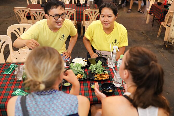 Saigon Night Street Food and City Tour on Scooter - A night ride through the city breaks up the meal