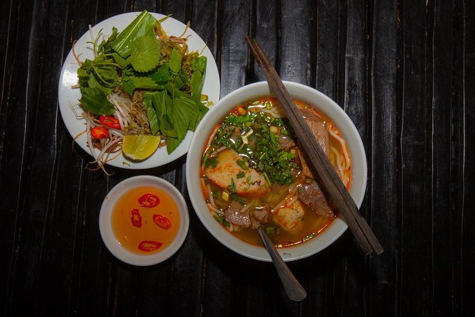 Saigon Night Street Food and City Tour on Scooter - Vietnamese barbecue is the evening’s big meal