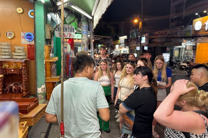 Saigon Night Walking Food Tour - 100% No Tourist - Vietnamese coffee above the evening traffic