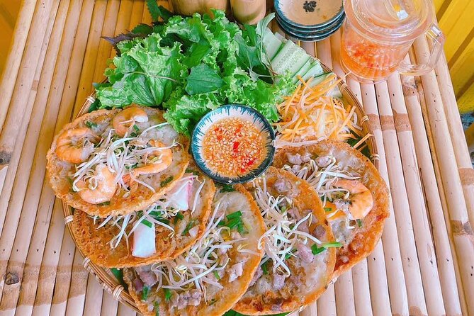 Saigon Scooter Adventure - City Sights & Street Food Tour - Nguyen Thien Thuat apartments and the first major food stop