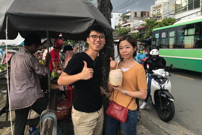 Saigon Slum tour and Saigon Chillspots by motorbike/ Aodai rider - Flowers, lotus shaping, and local custom