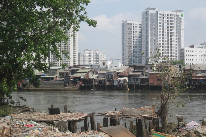 Saigon Slum tour, Chillspots tour by scooter | Female driver - From luxury towers to Saigon’s poorer lanes
