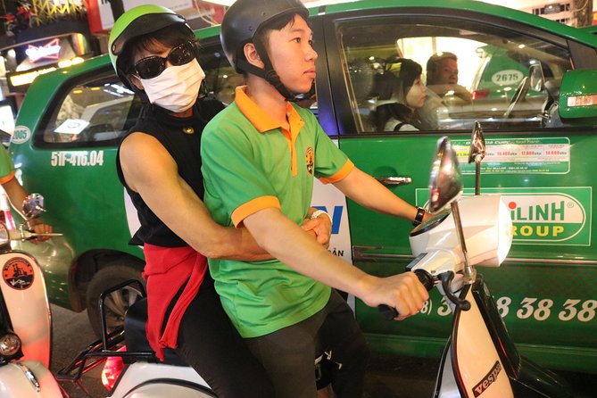 Saigon Vespa By Night Street Food Tour 4,5 Hours - Ho Chi Minh Square and the city after dark