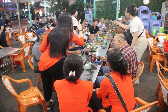 Saigon Vespa By Night Street Food With Female Riders Ao Dai - What the guides add to the evening