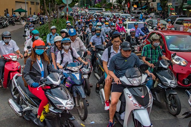 Small-group Street Food Lover by Motorbike (04 hours) - Ho Thi Ky Flower Market and its food stalls