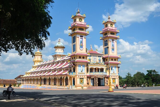 Tay Ninh Holy See - Cable Car & Cu Chi Tunnels | Small Group Tour - The Cao Dai Holy See and the midday ceremony