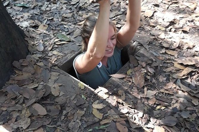 Vietnamese Cooking Class and Cu Chi Tunnels Tour from Ho Chi Minh City - Picking ingredients at an organic farm