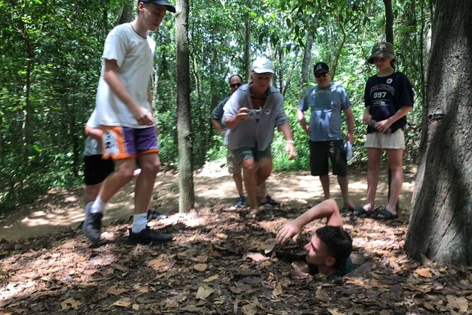 VIP Tour: Cu Chi Tunnels & Mekong Delta 1 Day | Shooting Guns - Entering the Cu Chi Tunnels