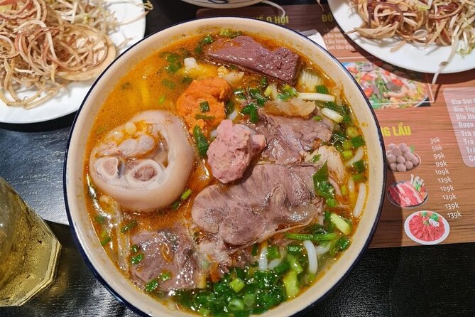 Walking Food Tour in HCM: 10 Must- Try Local Dishes & Hidden Gems - Southern Pho and a Glass of Sugarcane Juice